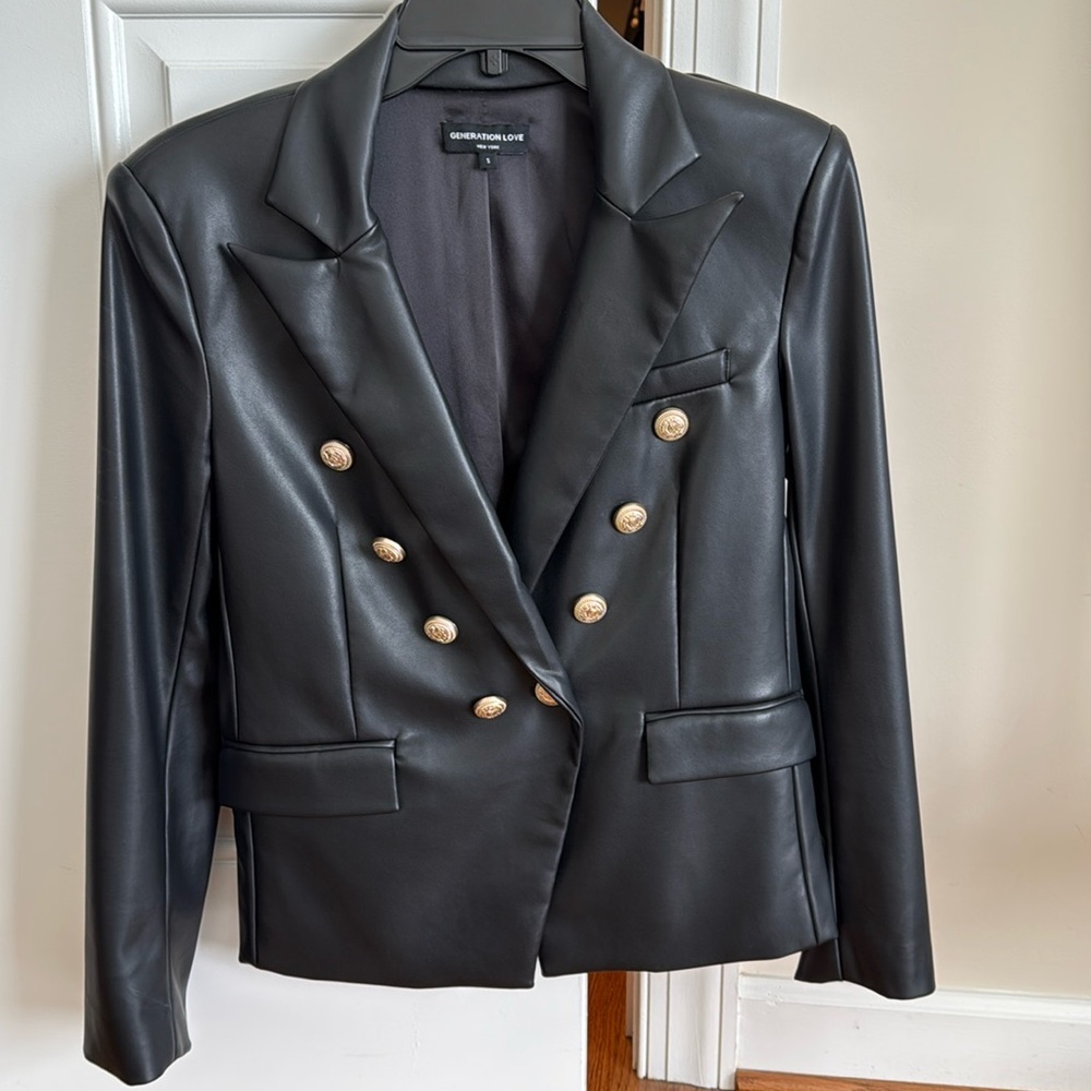 Generation Love black vegan leather blazer with gold buttons.